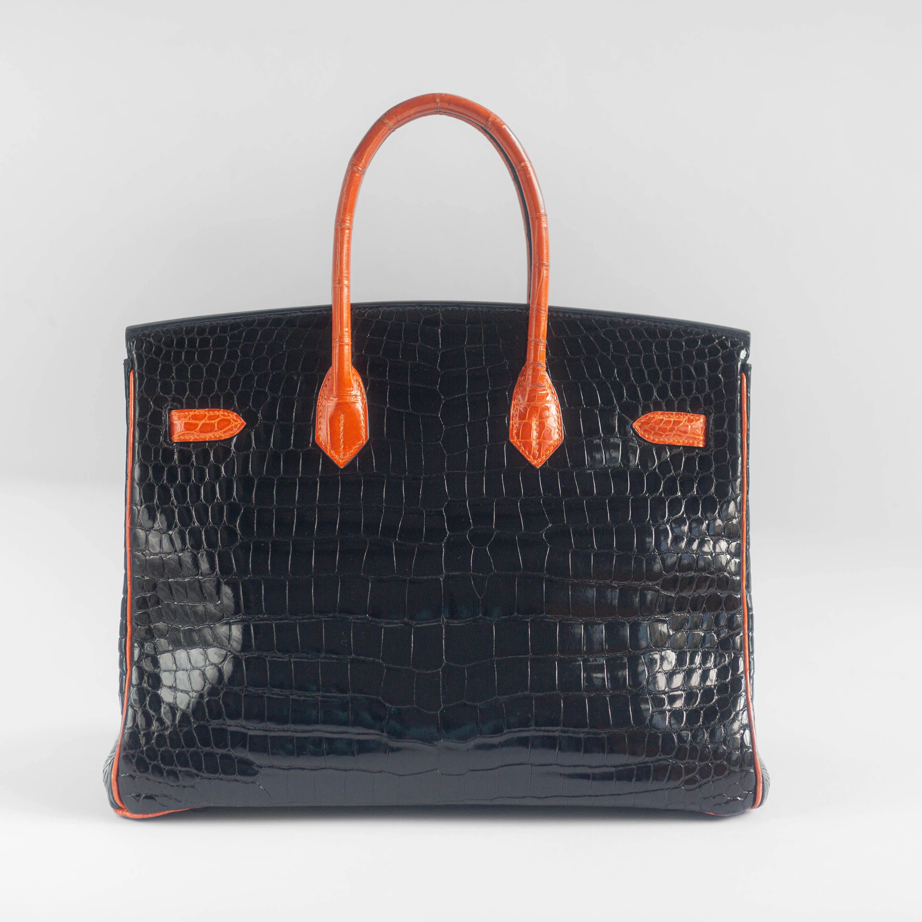 HERM??S - BIRKIN 35 LIMITED EDITION HANDBAG IN BLACK AND ORANGE SHINY POROSUS CROCODILE WITH RUTHENIUM HARDWARE