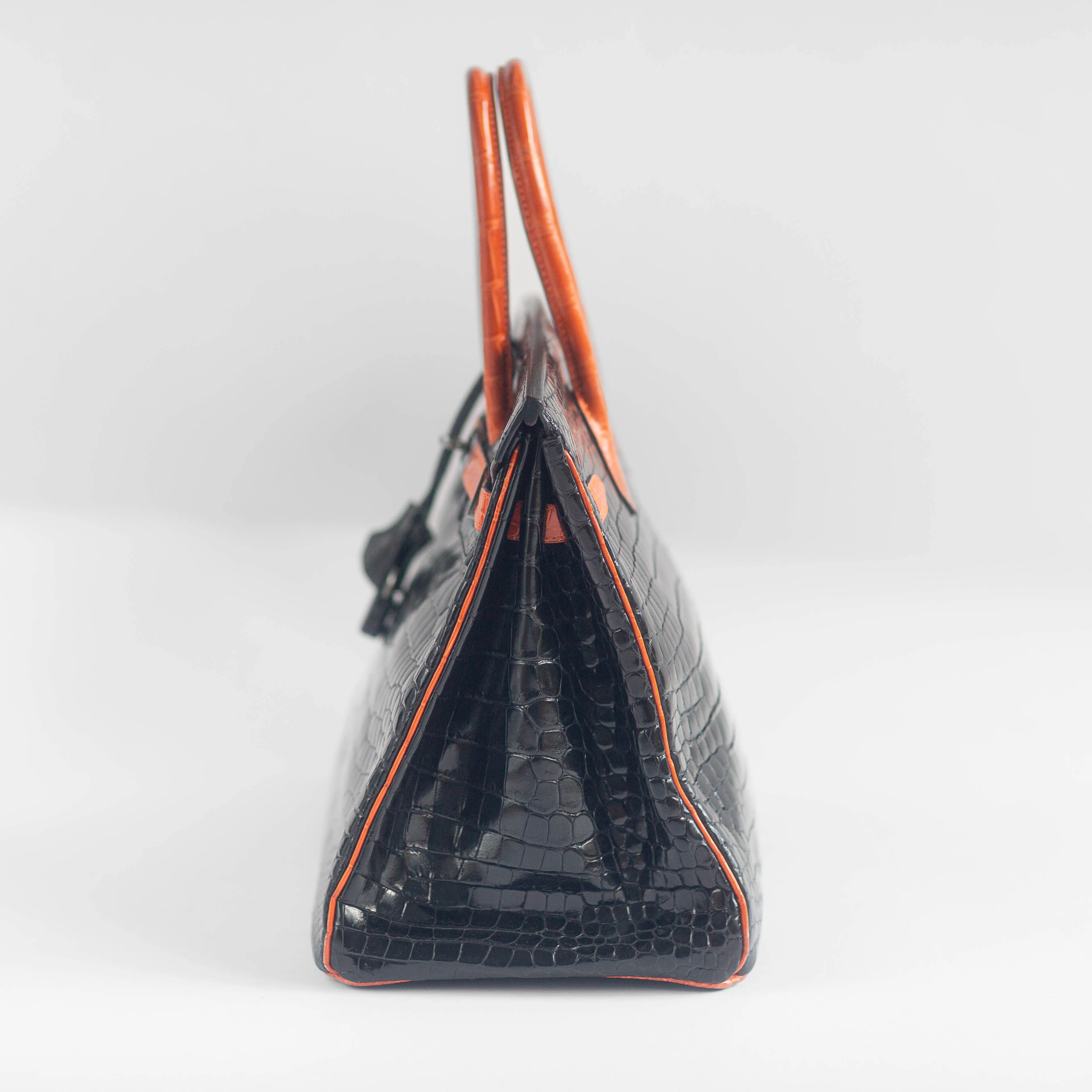 HERM??S - BIRKIN 35 LIMITED EDITION HANDBAG IN BLACK AND ORANGE SHINY POROSUS CROCODILE WITH RUTHENIUM HARDWARE