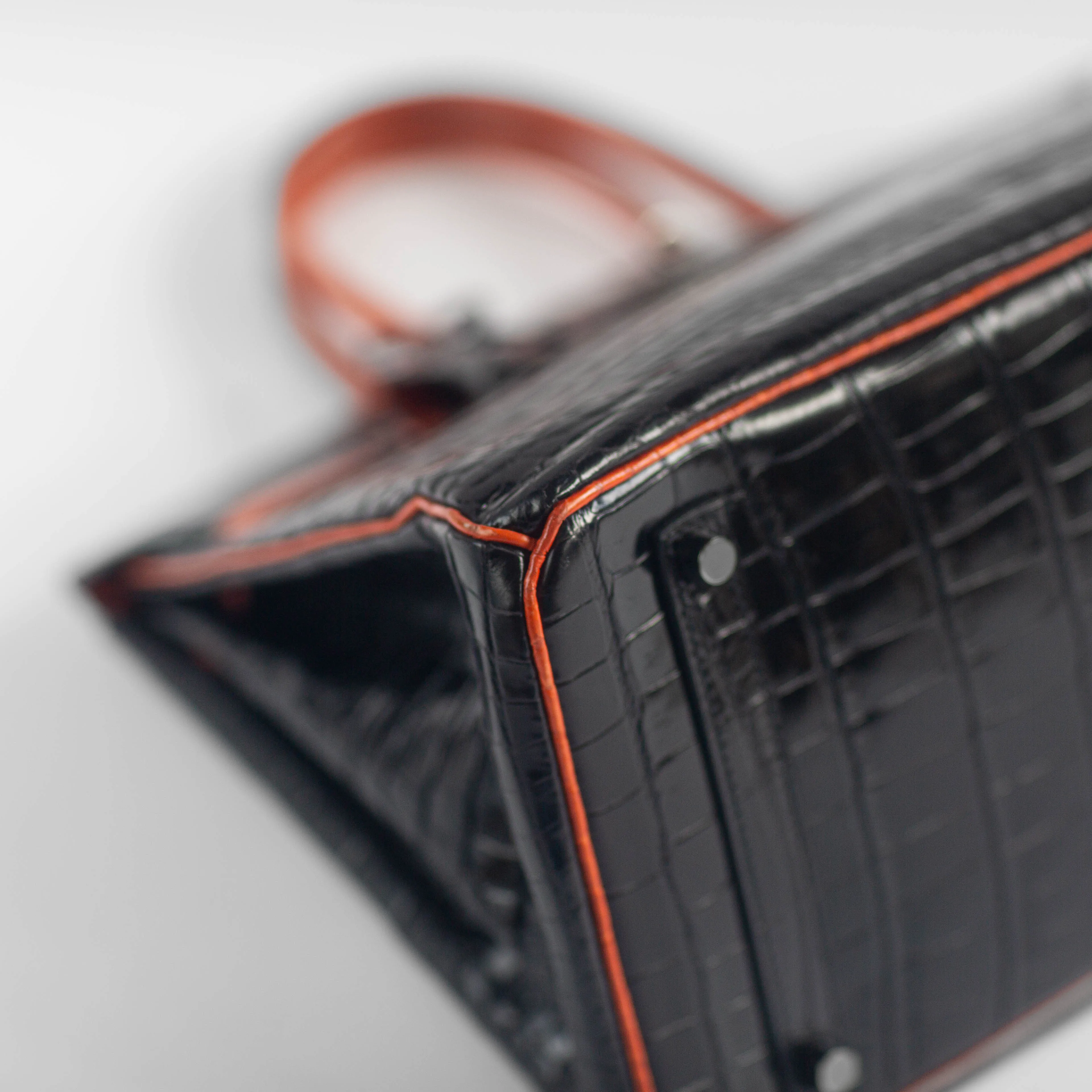 HERM??S - BIRKIN 35 LIMITED EDITION HANDBAG IN BLACK AND ORANGE SHINY POROSUS CROCODILE WITH RUTHENIUM HARDWARE