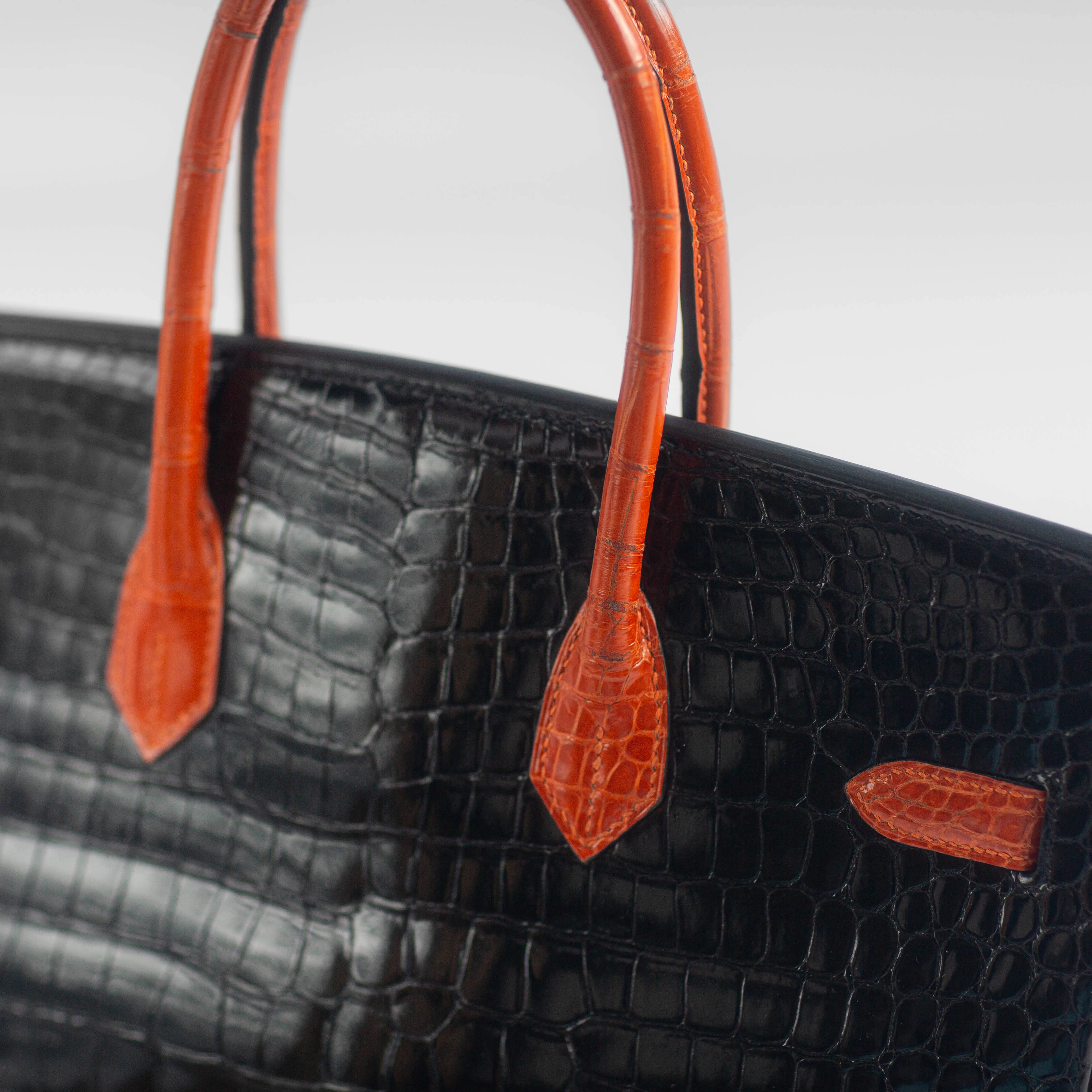 HERM??S - BIRKIN 35 LIMITED EDITION HANDBAG IN BLACK AND ORANGE SHINY POROSUS CROCODILE WITH RUTHENIUM HARDWARE