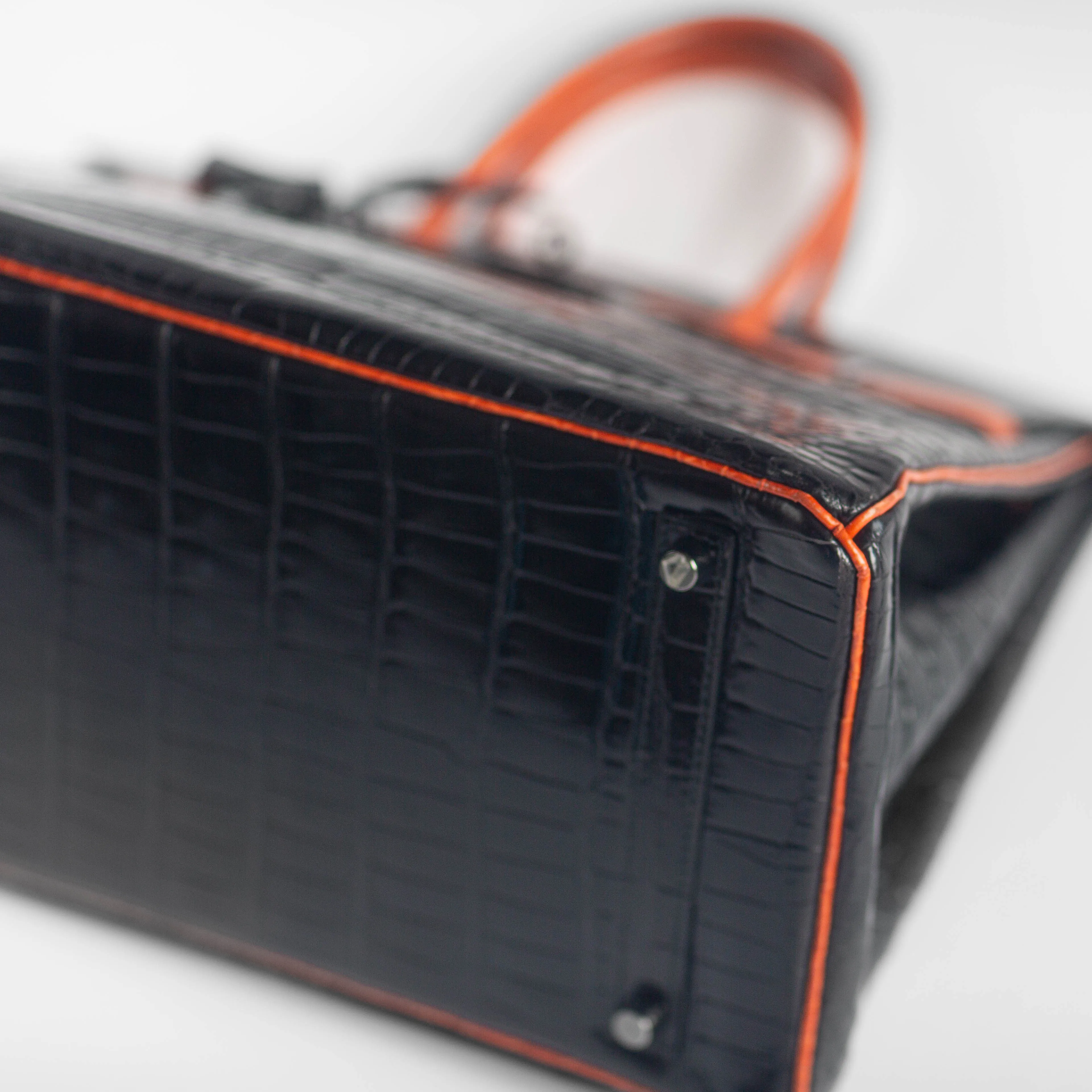 HERM??S - BIRKIN 35 LIMITED EDITION HANDBAG IN BLACK AND ORANGE SHINY POROSUS CROCODILE WITH RUTHENIUM HARDWARE
