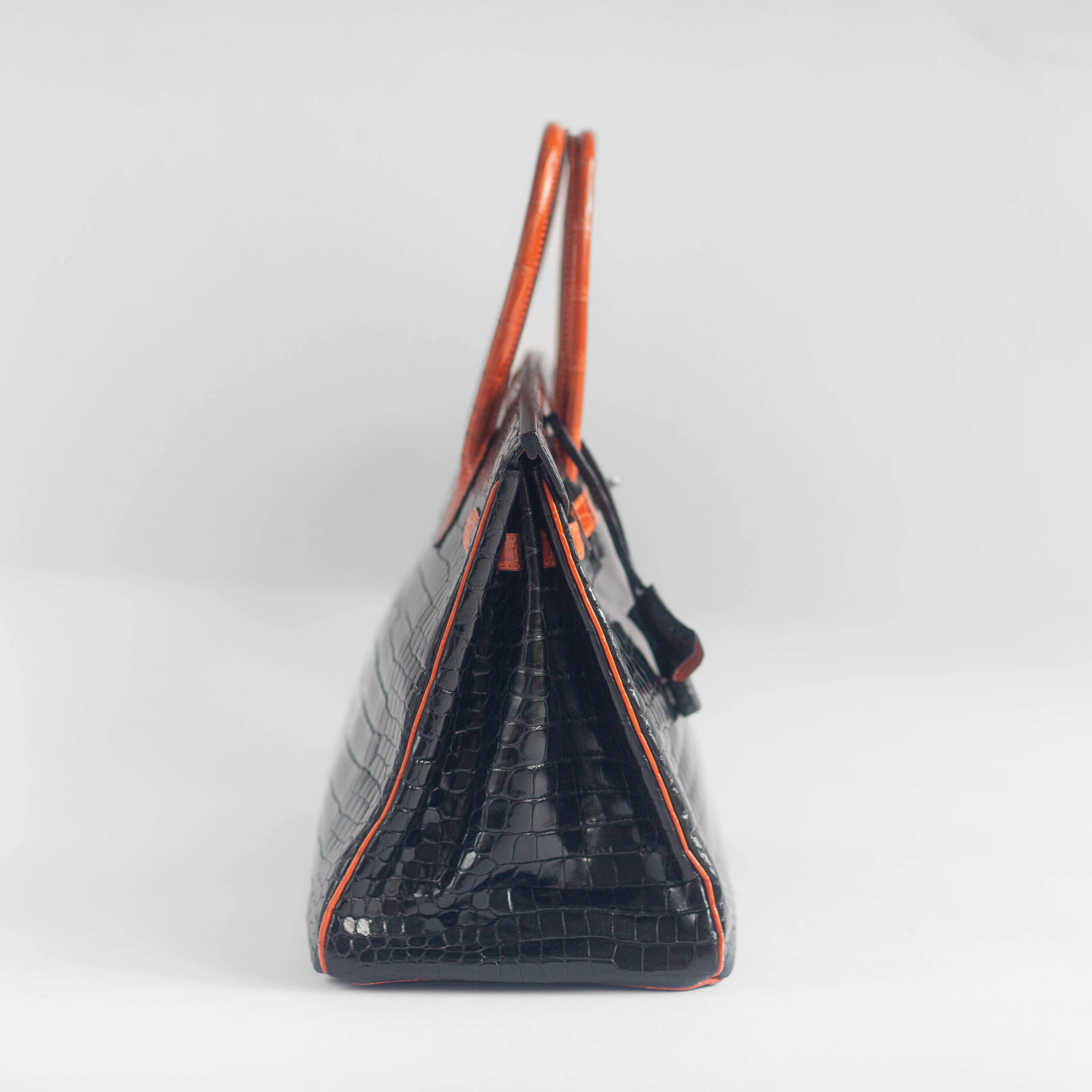 HERM??S - BIRKIN 35 LIMITED EDITION HANDBAG IN BLACK AND ORANGE SHINY POROSUS CROCODILE WITH RUTHENIUM HARDWARE