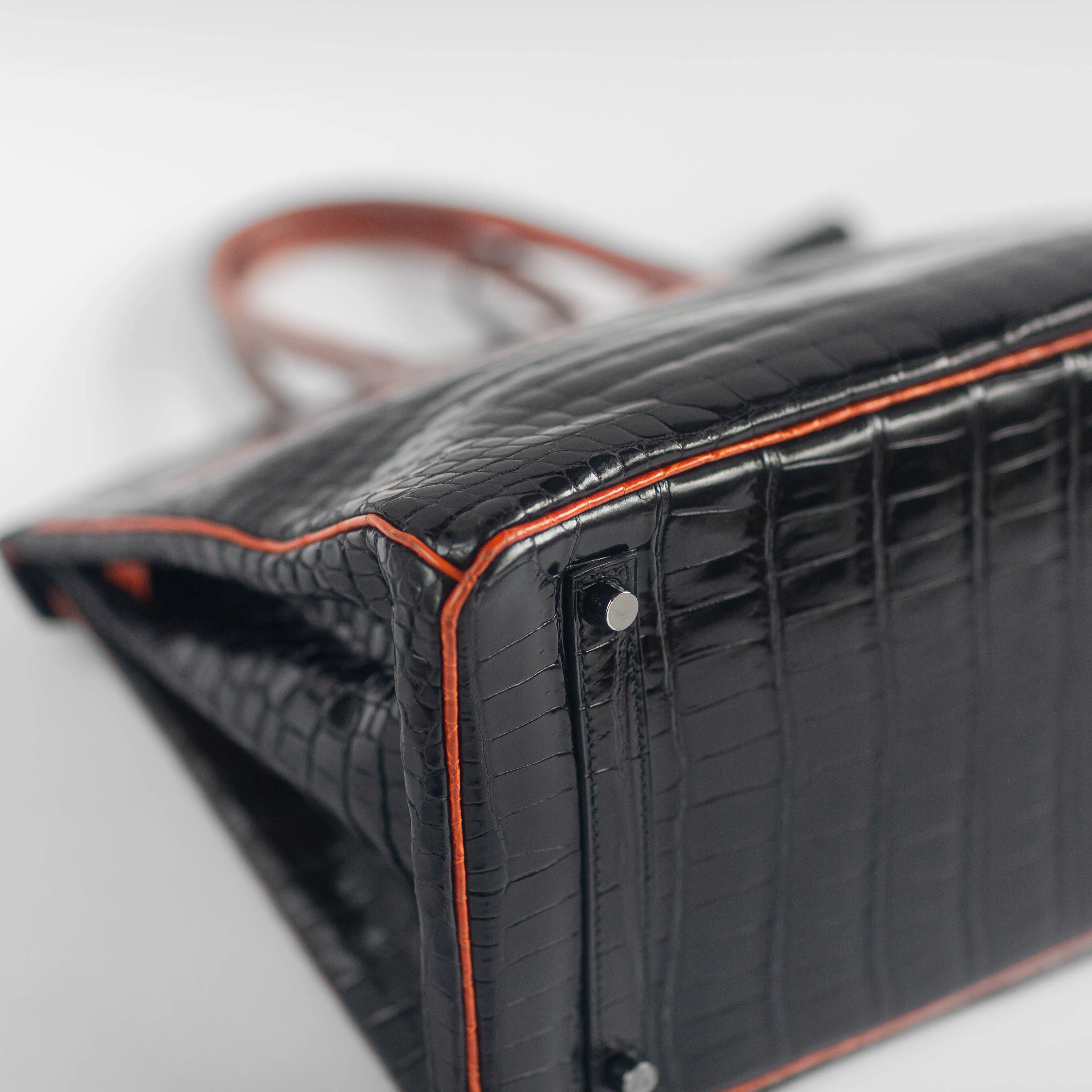 HERM??S - BIRKIN 35 LIMITED EDITION HANDBAG IN BLACK AND ORANGE SHINY POROSUS CROCODILE WITH RUTHENIUM HARDWARE