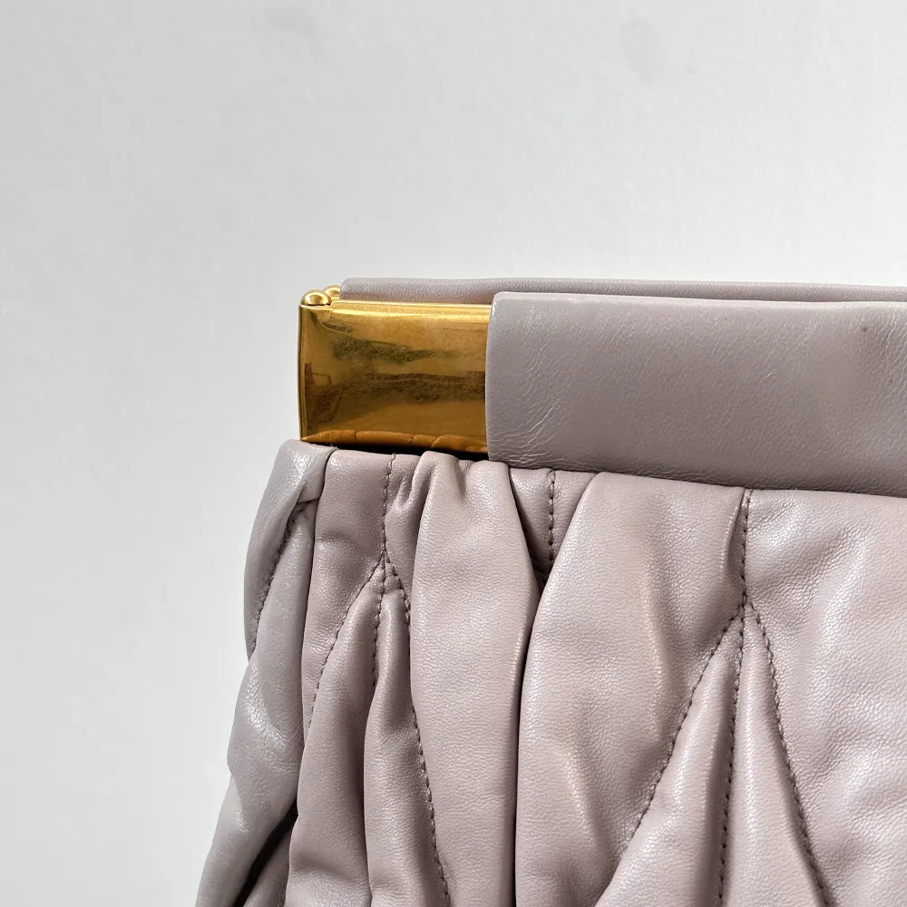 Putty Matelass?? Clutch
